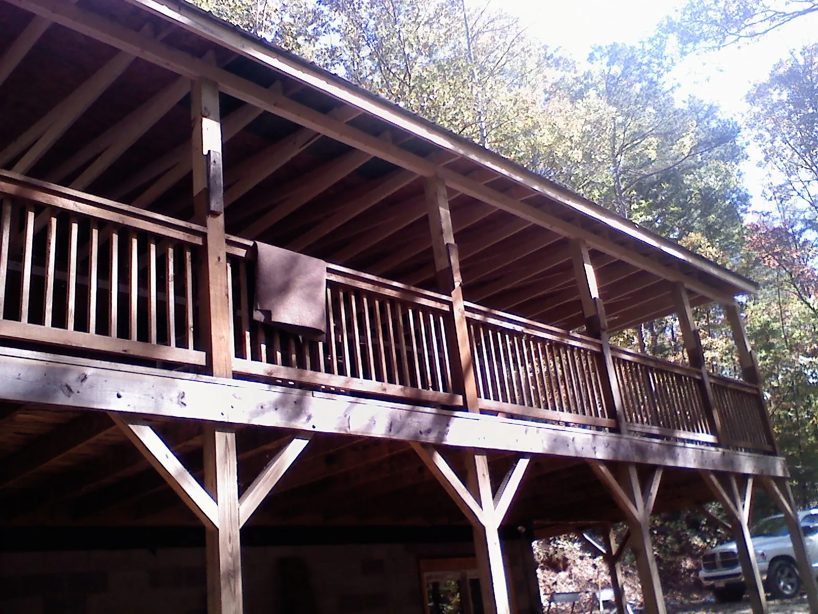 Timber framing under a new elevated porch and deck — Roof Leak Repair in La Canada Flintridge by Roofing Brothers